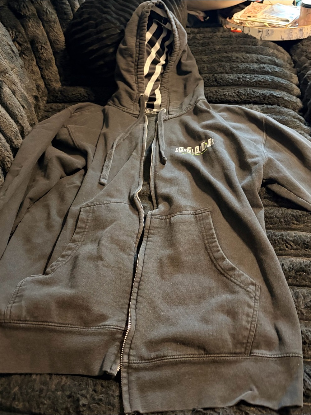 Black Zip Hoodie with Striped Hood Lining and Small Chest Logo